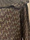 Blusa estampada con volante plisado