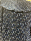 Blusa estampada con volante plisado