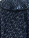 Blusa estampada con volante plisado