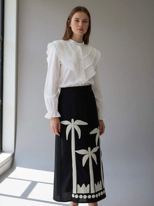 Look Palmira: Falda Negra con Palmeras