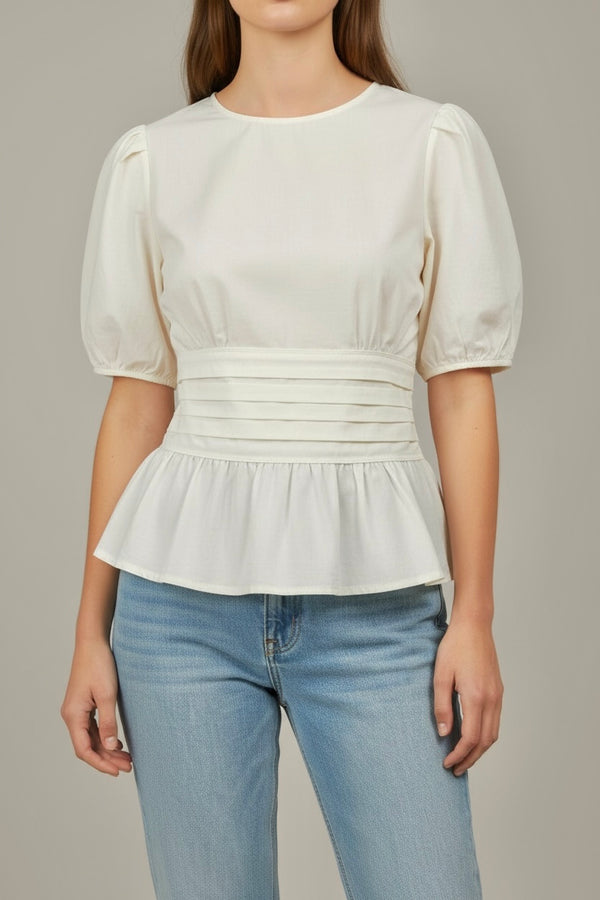 Blusa con jaretas y manga corta