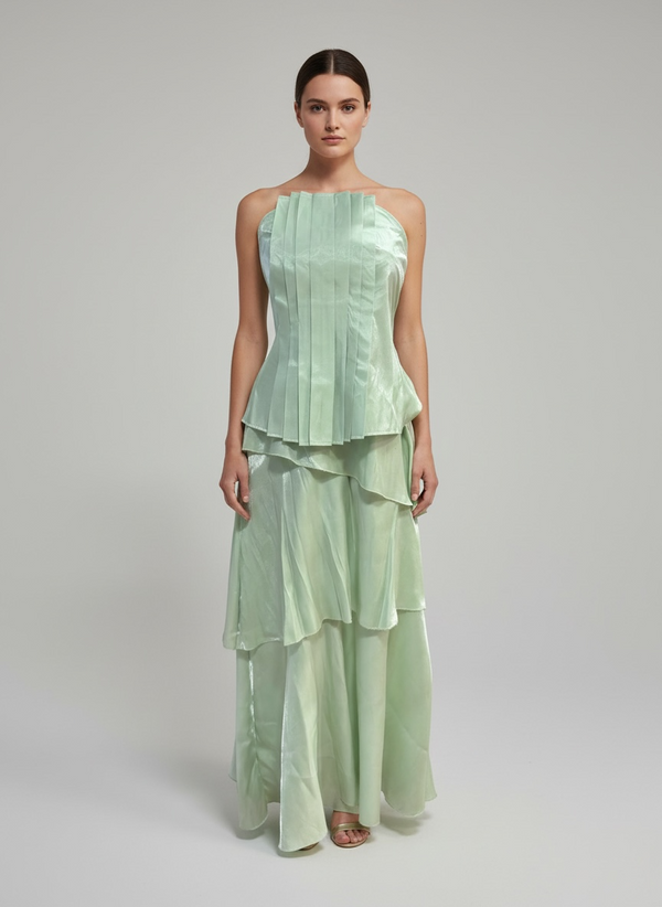 Conjunto corse plisado y falda larga por capas