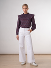 Blusa estampada con volante plisado