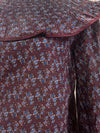 Blusa estampada con volante plisado
