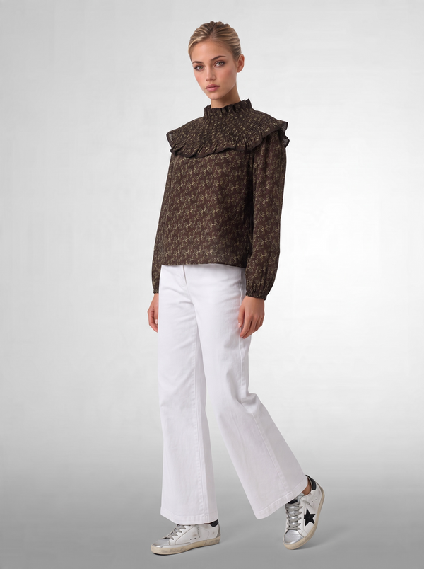 Blusa estampada con volante plisado
